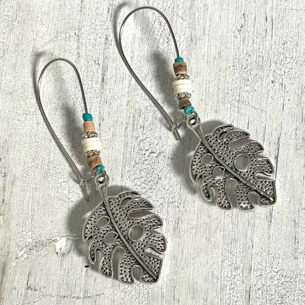 Silver tone leaf beaded earrings